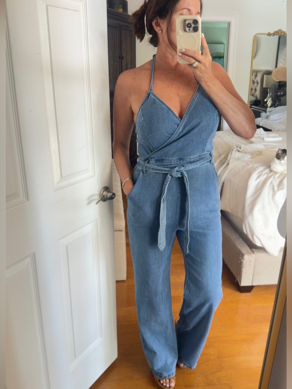 Lulu's Flirty Throwback
Medium Wash Denim Surplice Halter Jumpsuit Medium EUC